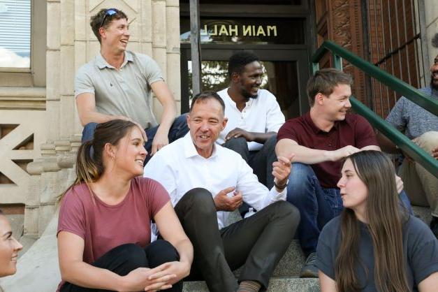 Group of people sitting on a staircase